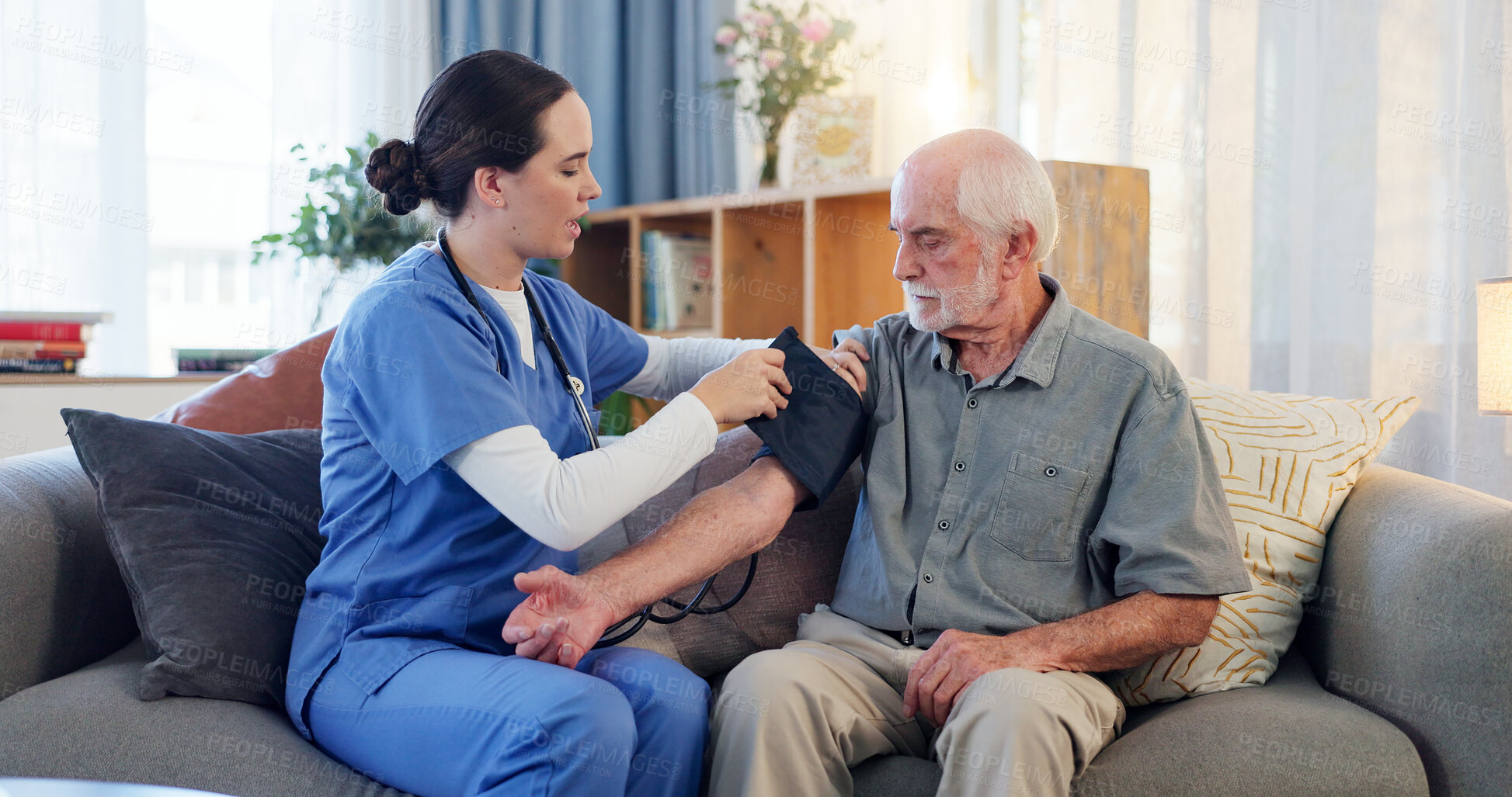 Buy stock photo Nurse, senior patient and checkup for blood pressure, heart beat and monitor wellness for health care on couch. Home, old man and caregiver with medical test, cardiology and consultation on sofa