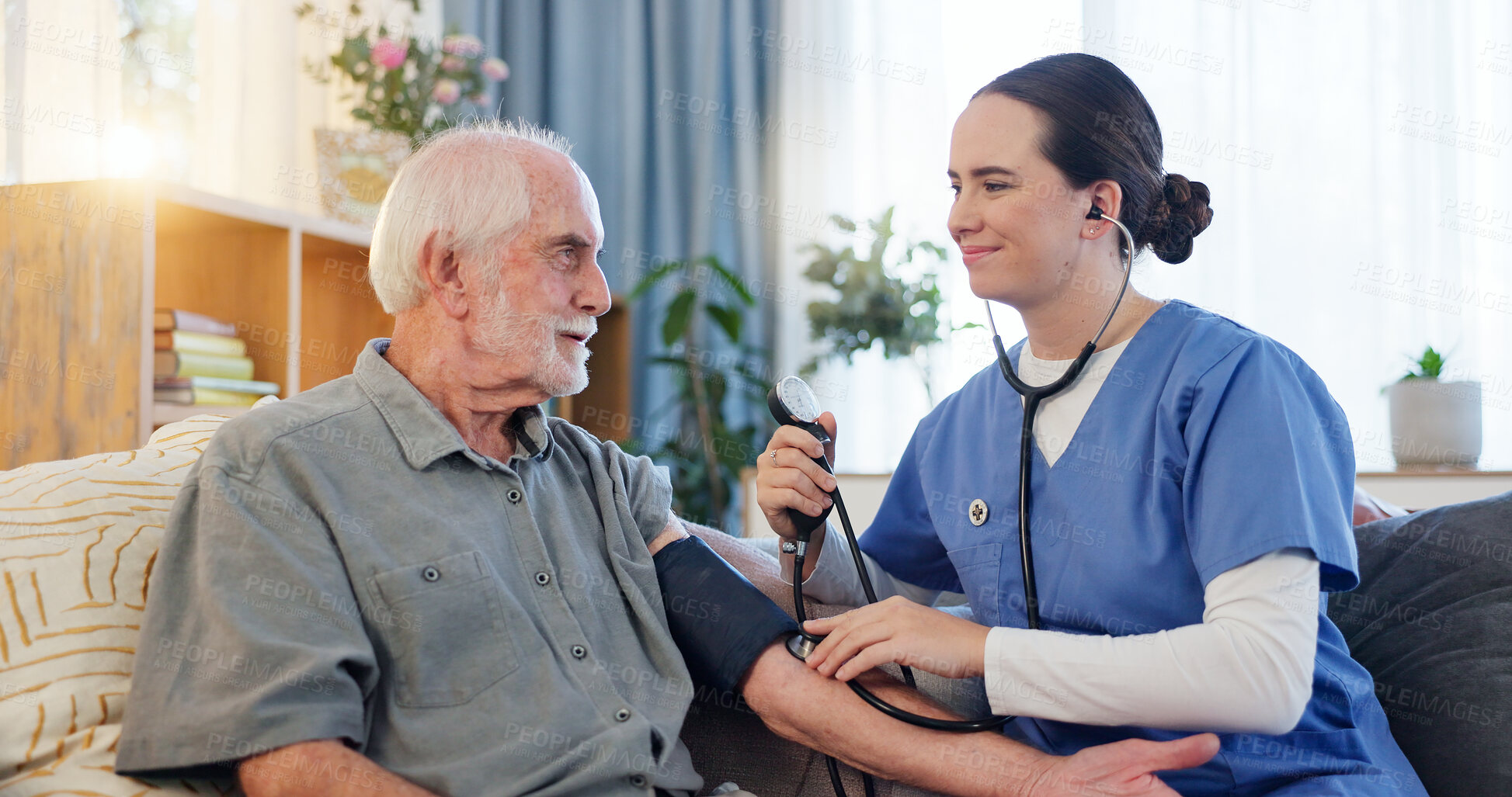 Buy stock photo Nurse, senior man and checkup for blood pressure, heart beat and monitor wellness for hypertension. Home, old patient and caregiver with medical test, cardiology and stethoscope on sofa in lounge