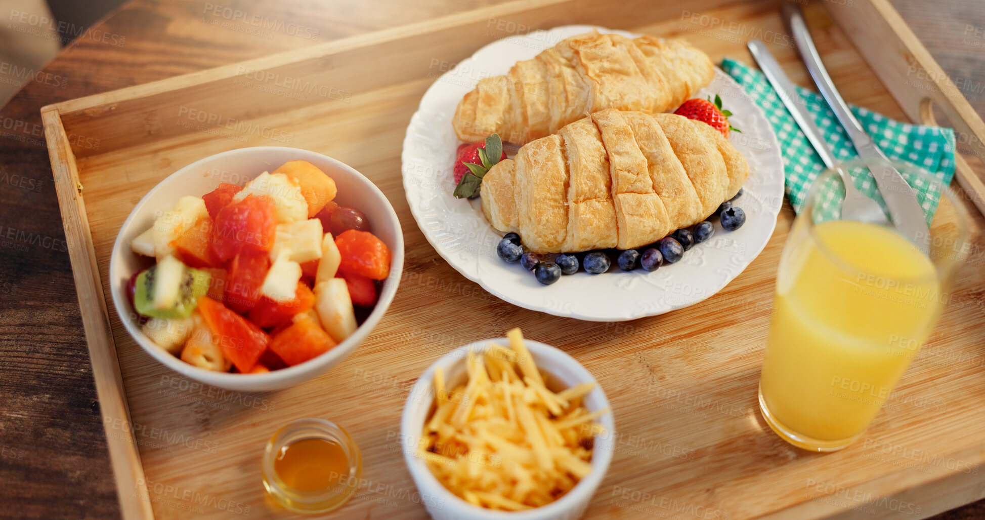 Buy stock photo Breakfast, diet and tray with food in dining room of home from above for health or nutrition. Fruit, juice in glass and sandwich with cheese in apartment for gourmet cuisine, hunger or organic meal