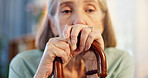 Walking stick, thinking and senior woman with disability in home, arthritis and depressed in retirement. House, elderly lady and worry with wooden cane for balance, vertigo disease and osteoporosis