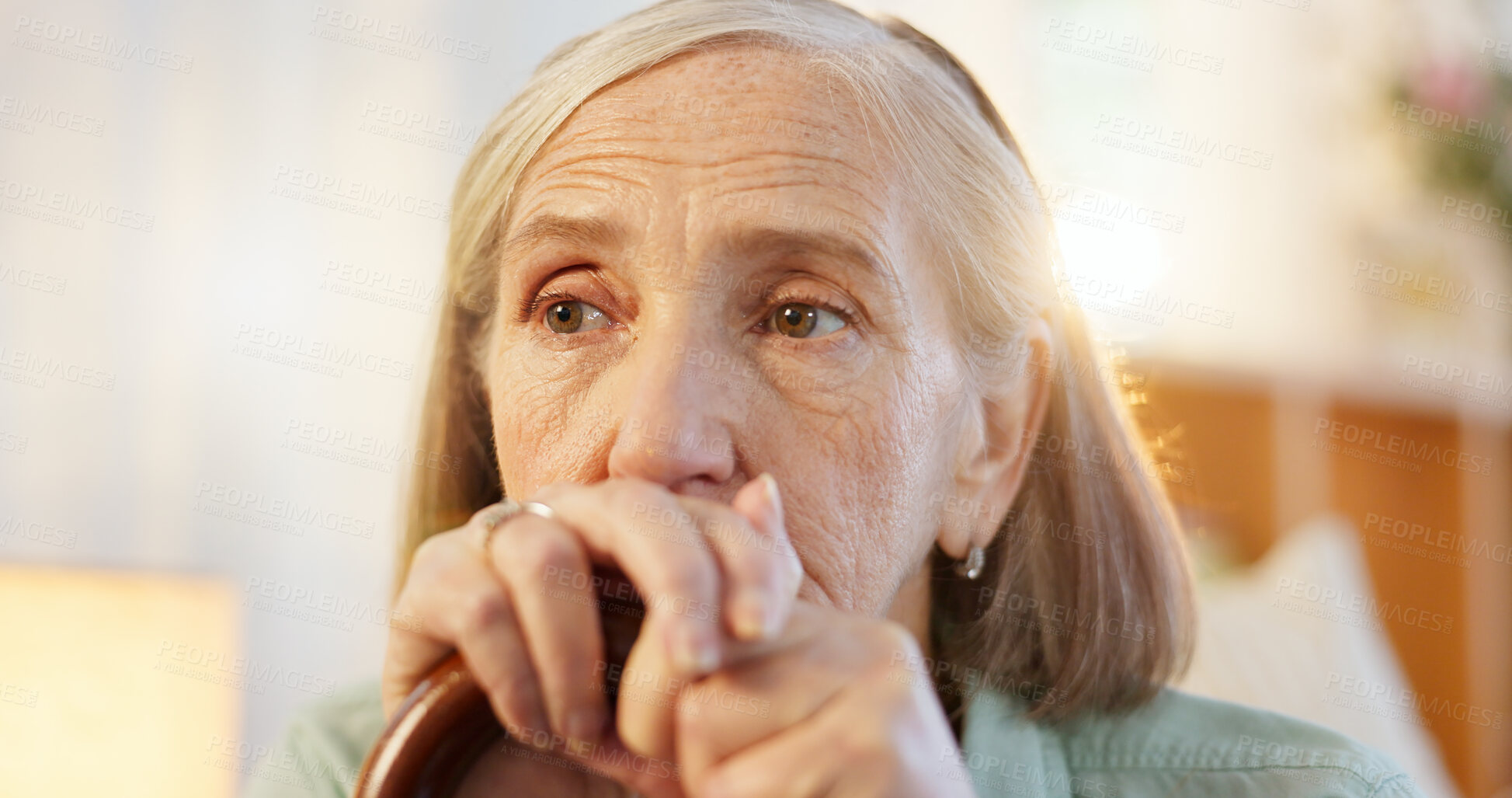 Buy stock photo Walking stick, memory and senior woman with disability at home, arthritis and depressed in retirement. House, elderly lady and thinking with wooden cane for balance, vertigo disease and osteoporosis