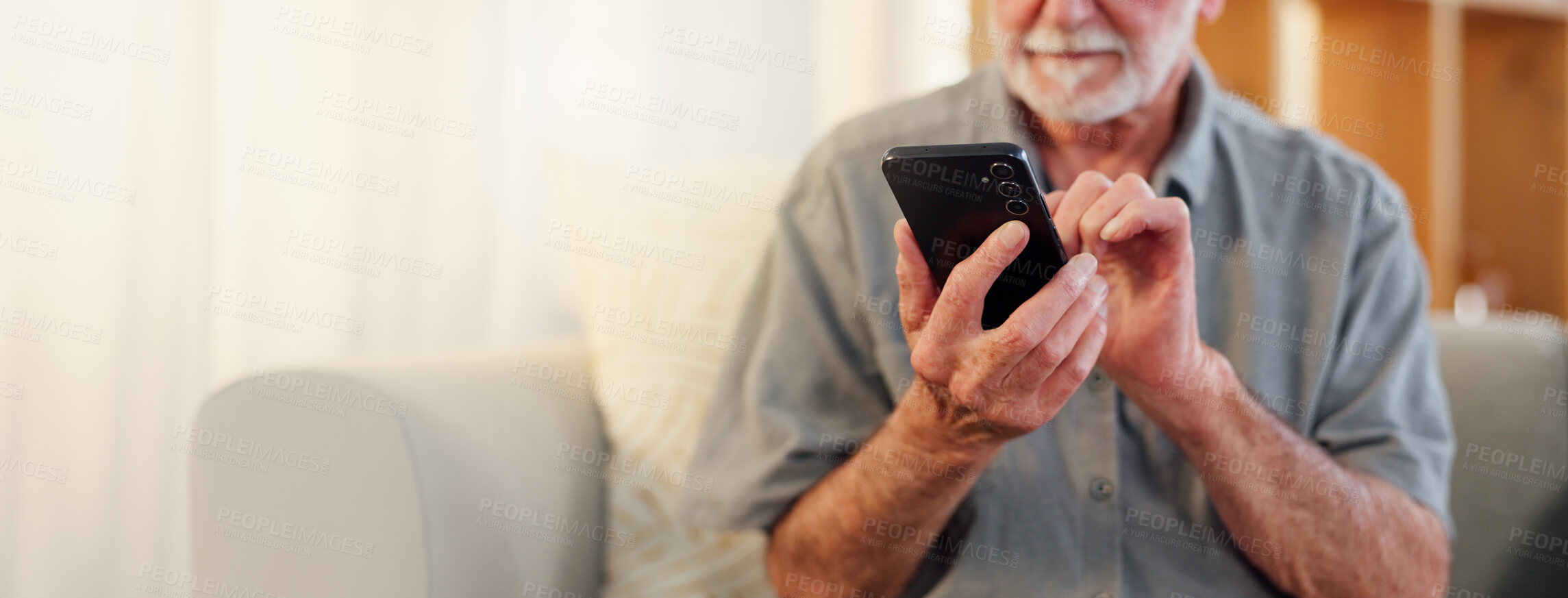 Buy stock photo Hands, phone and space with senior man on sofa in living room of retirement home for communication. Connection, mobile and internet with elderly person checking app for bank, health or pension