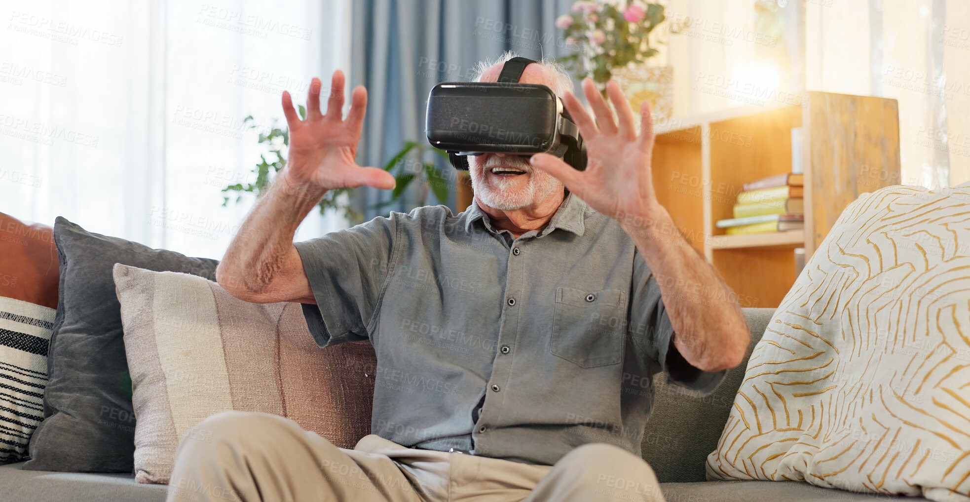 Buy stock photo VR technology, home and elderly man with smile on sofa for digital, games and cognitive benefits. Happy, person and user experience with augmented reality for metaverse, learning and interaction