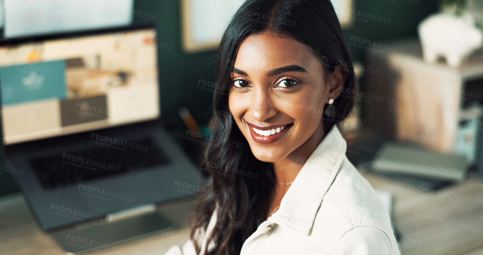 Buy stock photo Portrait, business and Indian woman with laptop, smile and confidence in office for creative agency. Face, consultant and happy graphic designer with career ambition, website layout or online project