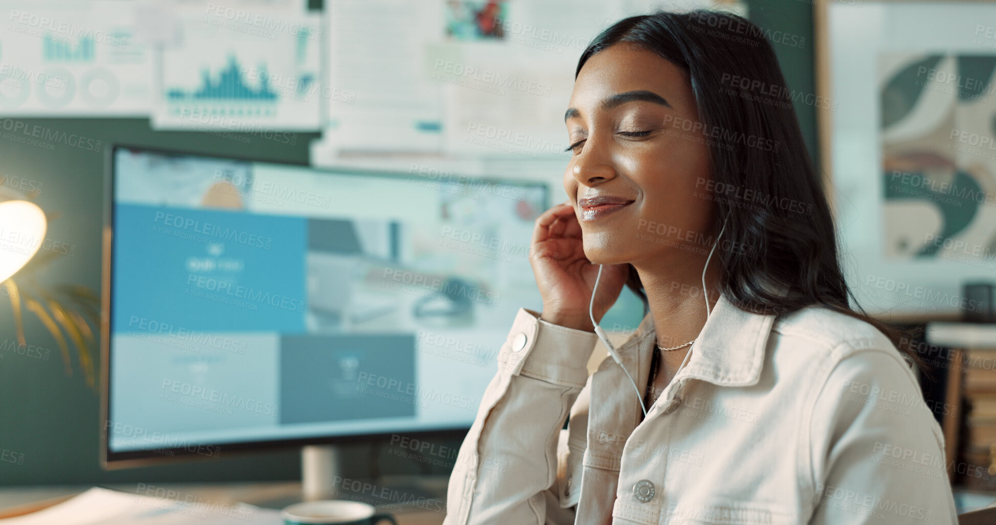 Buy stock photo Indian woman, earphones and music to relax, desk and thinking for story, journalist and smile. Office, contemplating and reporter with ideas for news, inspiration and process for media agency