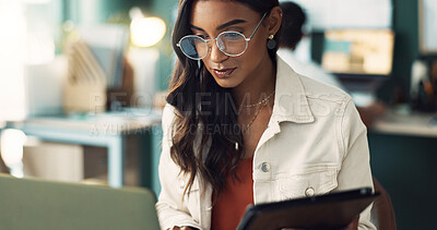 Buy stock photo Tablet, laptop and business woman research at startup office for project, report or information. Computer, technology or creative editor with news article, story or reading email for blog on internet