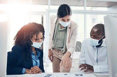 Buy stock photo Collaboration, mask and planning with business people at desk in office for meeting together. Computer, conversation and diversity with employee group in workplace for company strategy or decision