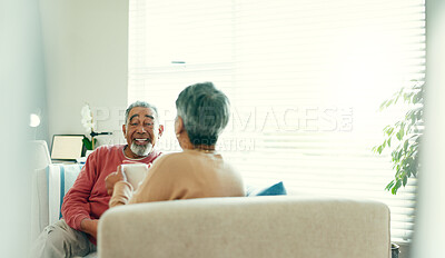 Buy stock photo Tea time, happy and elderly couple in living room for love, story telling and bonding at home. Senior man, woman and relax on sofa with talking, nostalgia and commitment or support in retirement