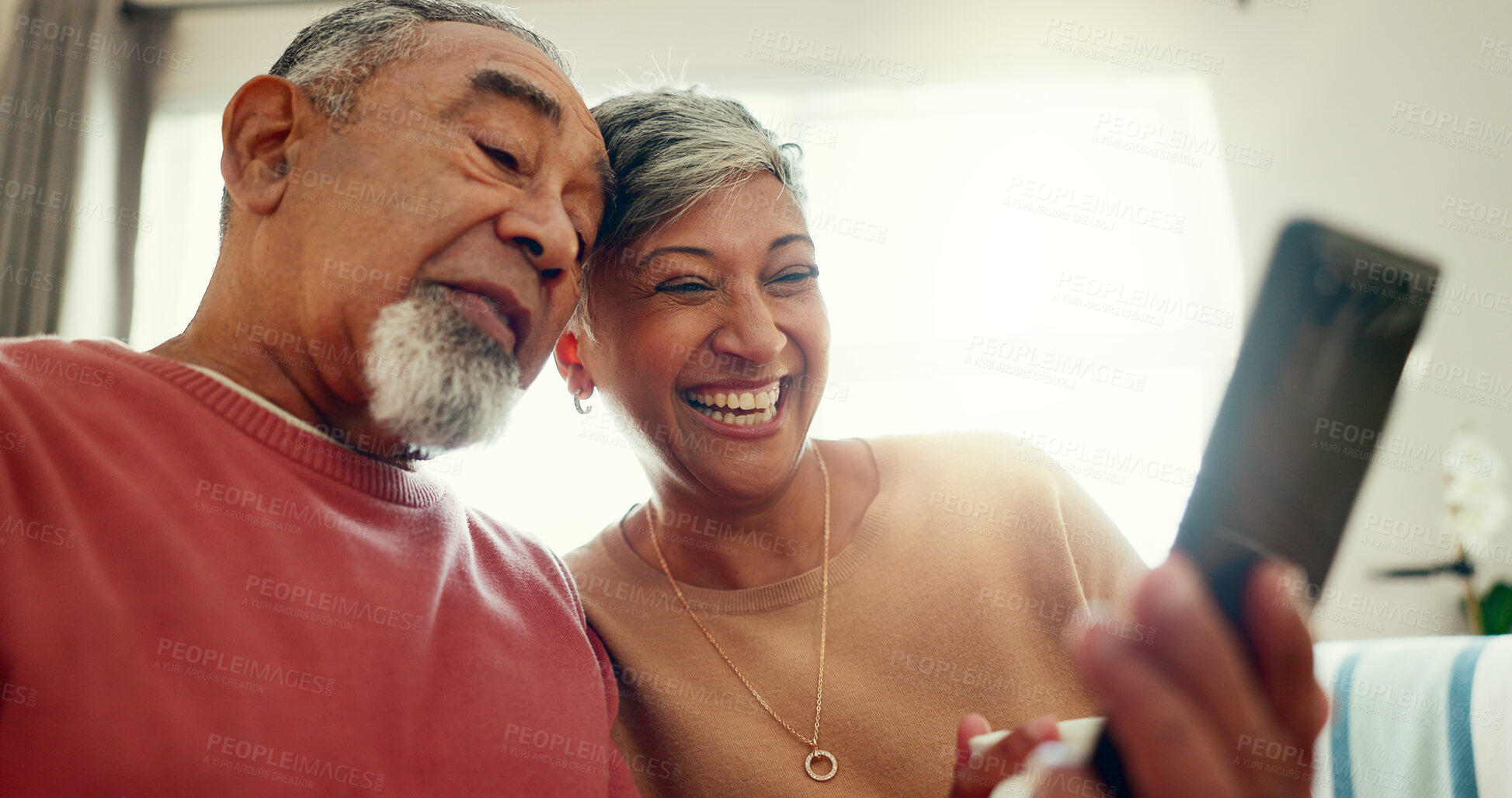 Buy stock photo Video call, smile and senior couple on sofa with mobile for communication, networking or chat. Online, happy woman and elderly man with smartphone for relax, social media or contact family in home