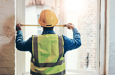 Buy stock photo Engineer, man and measure window for construction, renovation and maintenance with back view. Architect, tape and check building with tools for size, length inspection and accuracy for home repairs