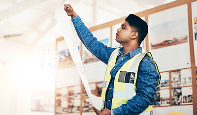 Buy stock photo Architect, man and paper with blueprint in office for project development or review of property. Architecture, planning or person with document for renovation design, inspection or reading floor plan