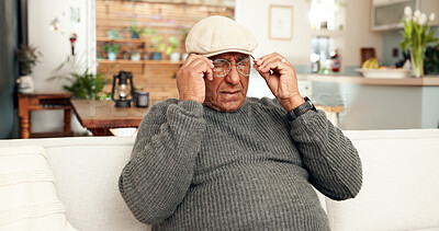 Buy stock photo Senior man, pain and glasses on couch in home living room, eye strain and fatigue in lounge. Prescription, tired and retirement for frustrated male person, brain fog and tension or headache pressure 