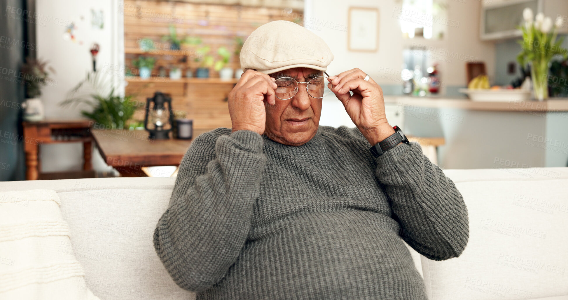 Buy stock photo Senior man, pain and glasses on couch in home living room, eye strain and fatigue in lounge. Prescription, tired and retirement for frustrated male person, brain fog and tension or headache pressure 