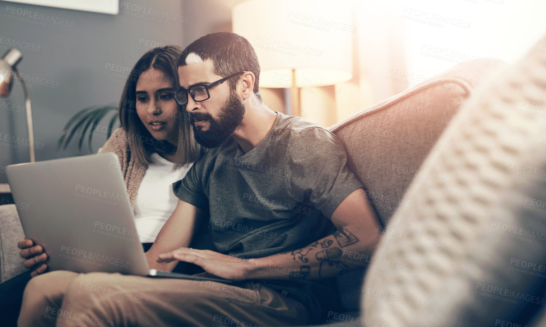 Buy stock photo Laptop, research and couple on sofa in home reading presidential election results with concern. Computer, information and people with bad news on politics blog for online announcement in house.