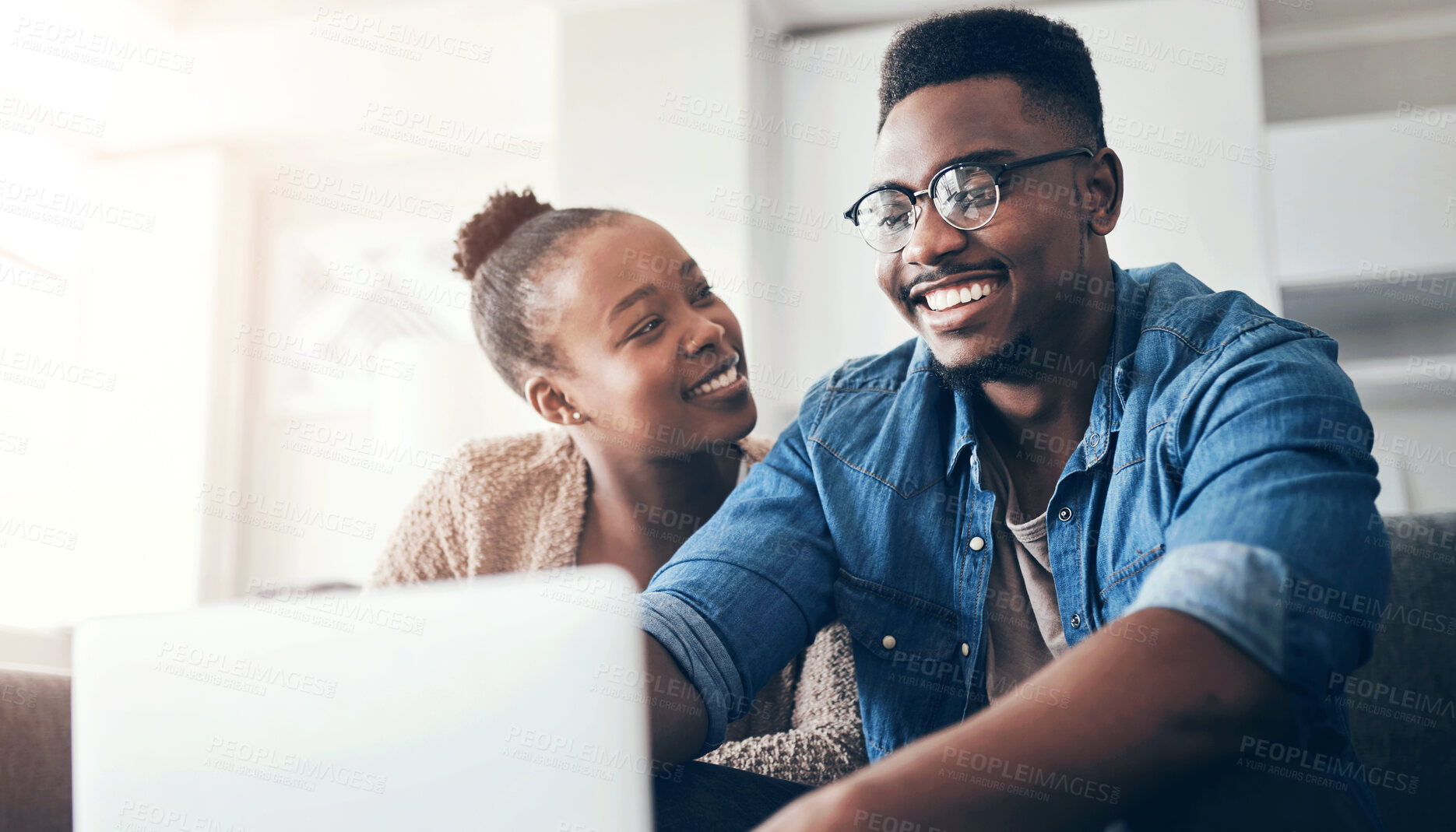 Buy stock photo House, finance and black couple on sofa, laptop and mortgage with planning for budget. African people, man and woman on couch, computer and savings with internet, connection and insurance with taxes