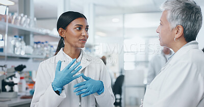 Buy stock photo Women, scientist and chat in lab for medical study or feedback on test investigation and results. Coach, intern and discuss for science research on internship program with teamwork or collaboration