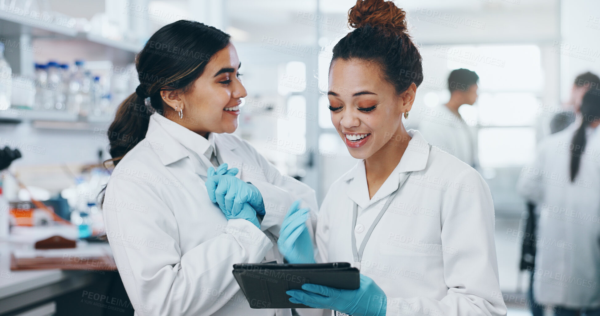 Buy stock photo Science, happy team and tablet in lab for results, vaccine development or online feedback. Women, technology or excited for breakthrough with medical report, update or virus study for pharmaceuticals