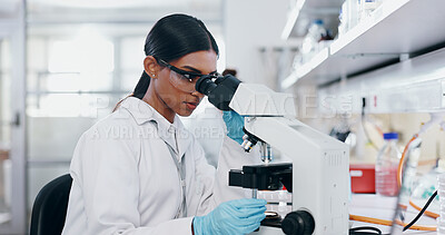 Buy stock photo Medical, research and woman with microscope, healthcare and check experiment for cancer treatment. Person, scientist and employee with lab equipment, vaccine and cure development with biochemistry