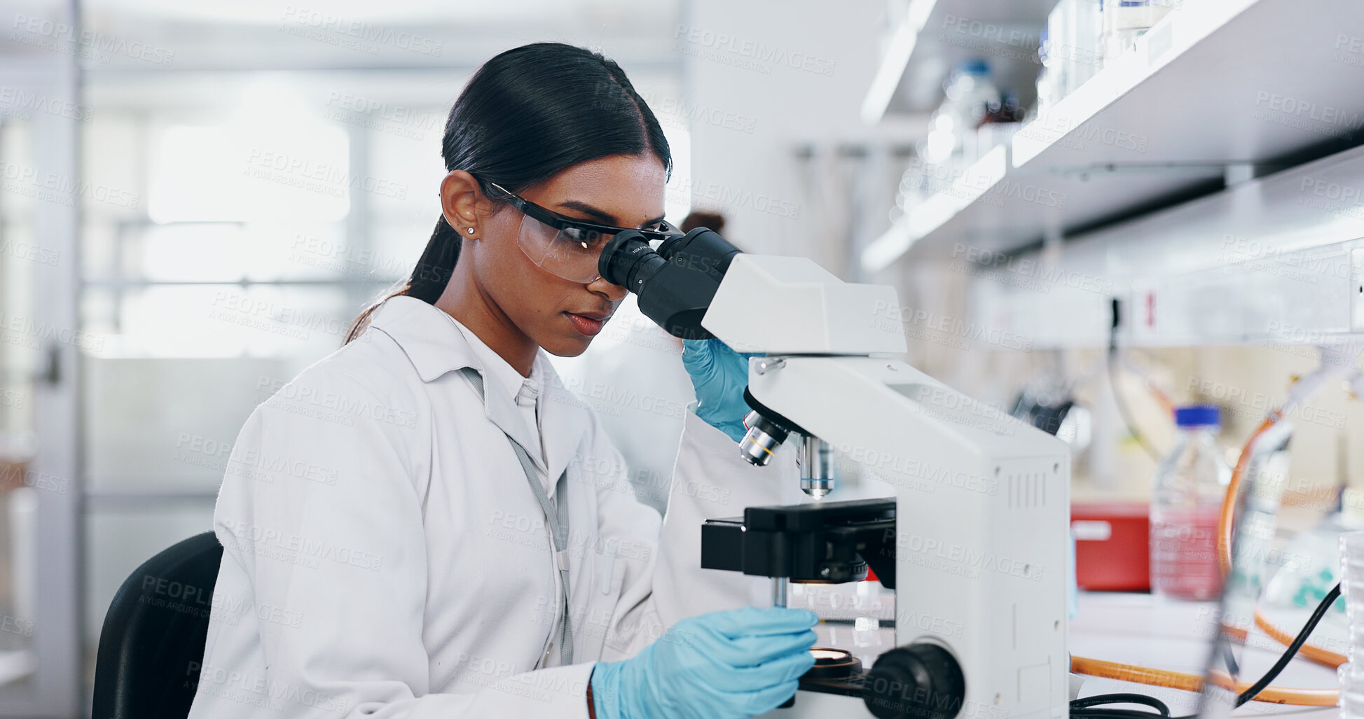 Buy stock photo Medical, research and woman with microscope, healthcare and check experiment for cancer treatment. Person, scientist and employee with lab equipment, vaccine and cure development with biochemistry