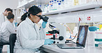 Laptop, research and woman with microscope, science and check experiment for sample, biotech and bacteria. Person, scientist and employee with lab equipment, vaccine and cure development with expert