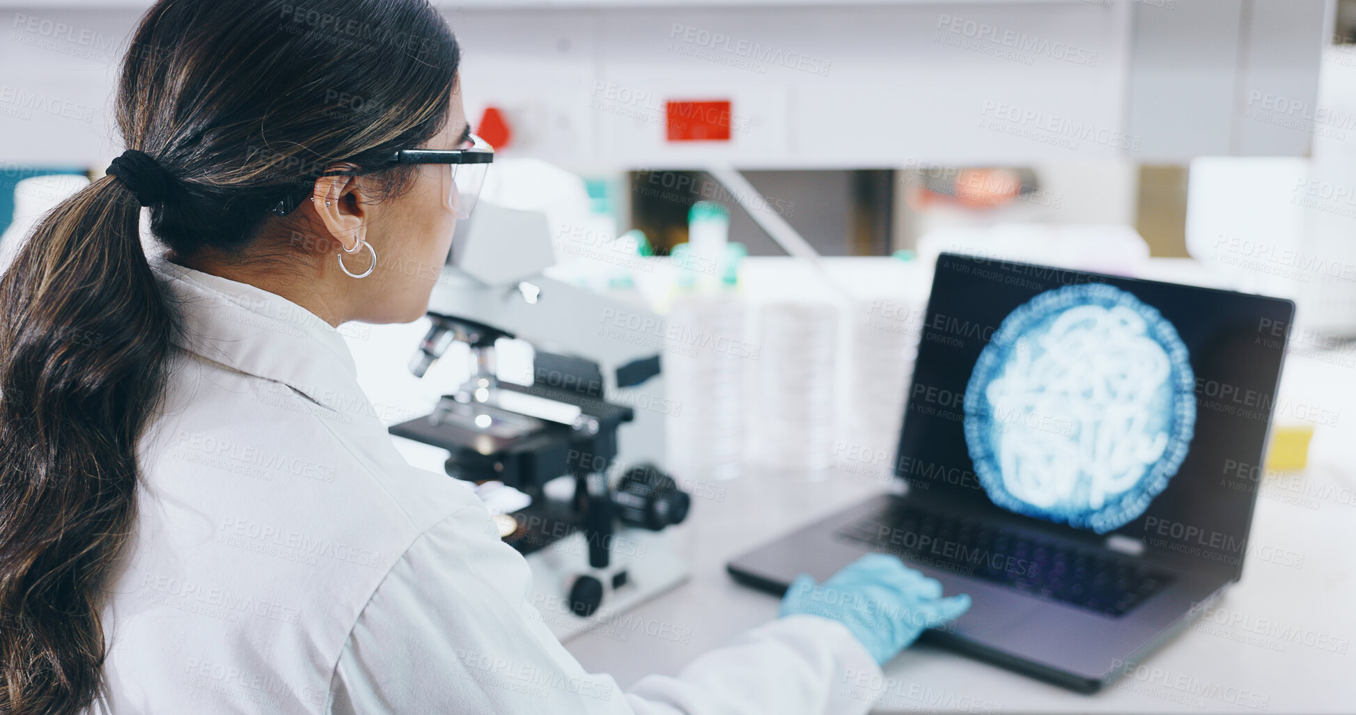 Buy stock photo Woman, scientist and laptop with microscope in lab, microbiology and research study of organisms. Specimen, analysis and bacteria or antimicrobial resistance, digital imaging and vaccine development
