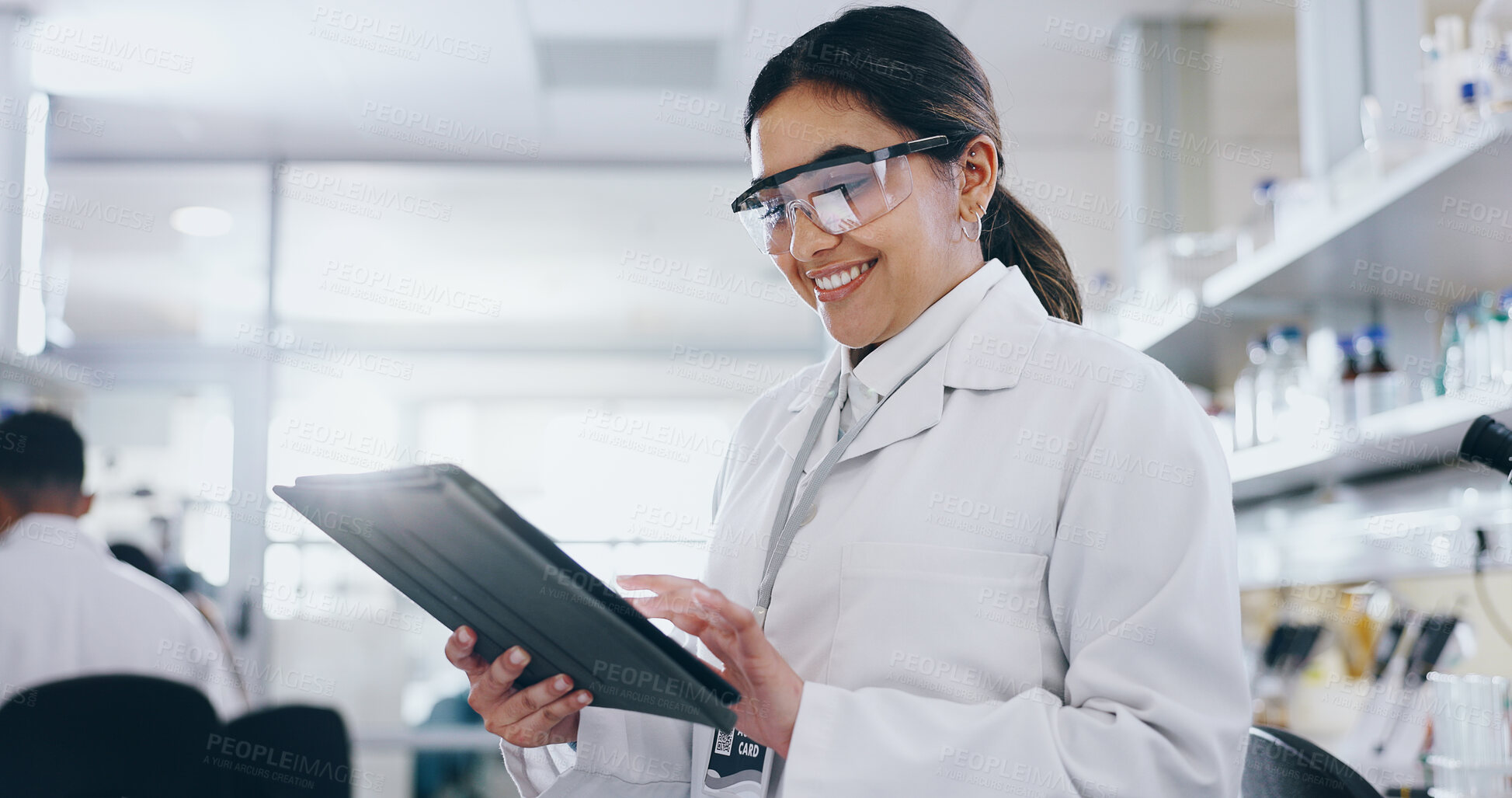 Buy stock photo Happy, science and tablet with woman in laboratory for discovery, innovation or pharmaceutical research. Breakthrough, investigation and smile with scientist reading medical info for development