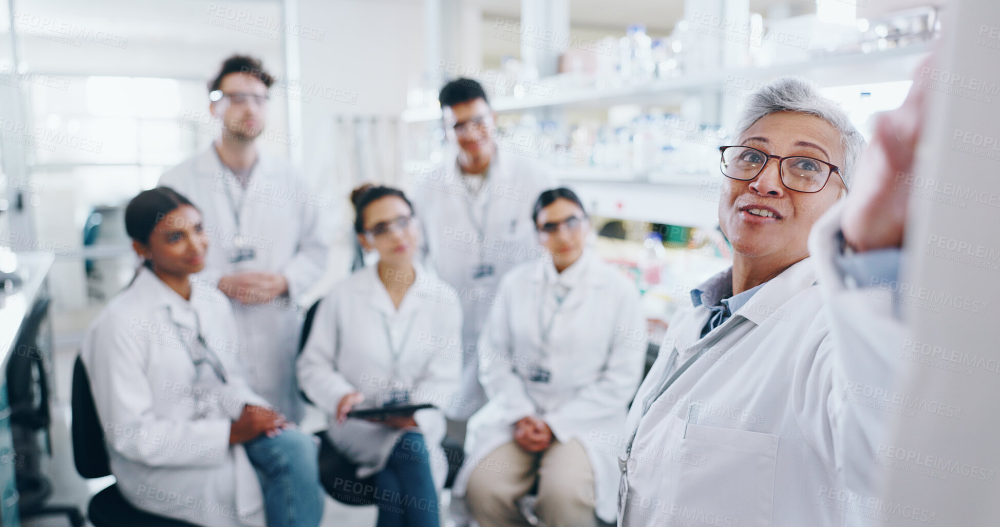 Buy stock photo Presentation, research and group of scientists in laboratory with mentor for bio medical internship. Study, discussion and pharmaceutical science students with lecturer for experiment or discovery.