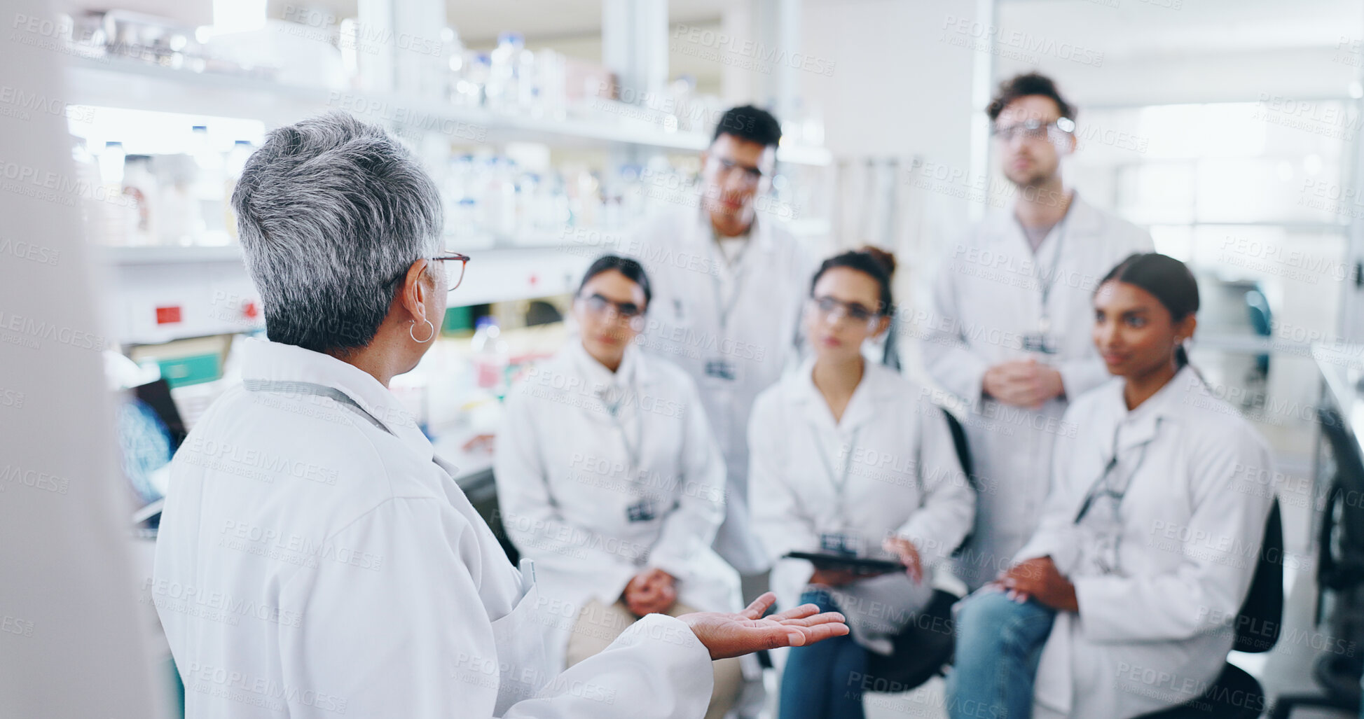 Buy stock photo Meeting, research and team of scientists in laboratory with mentor for bio medical internship. Study, discussion and group of pharmaceutical science students with lecturer for experiment or discovery