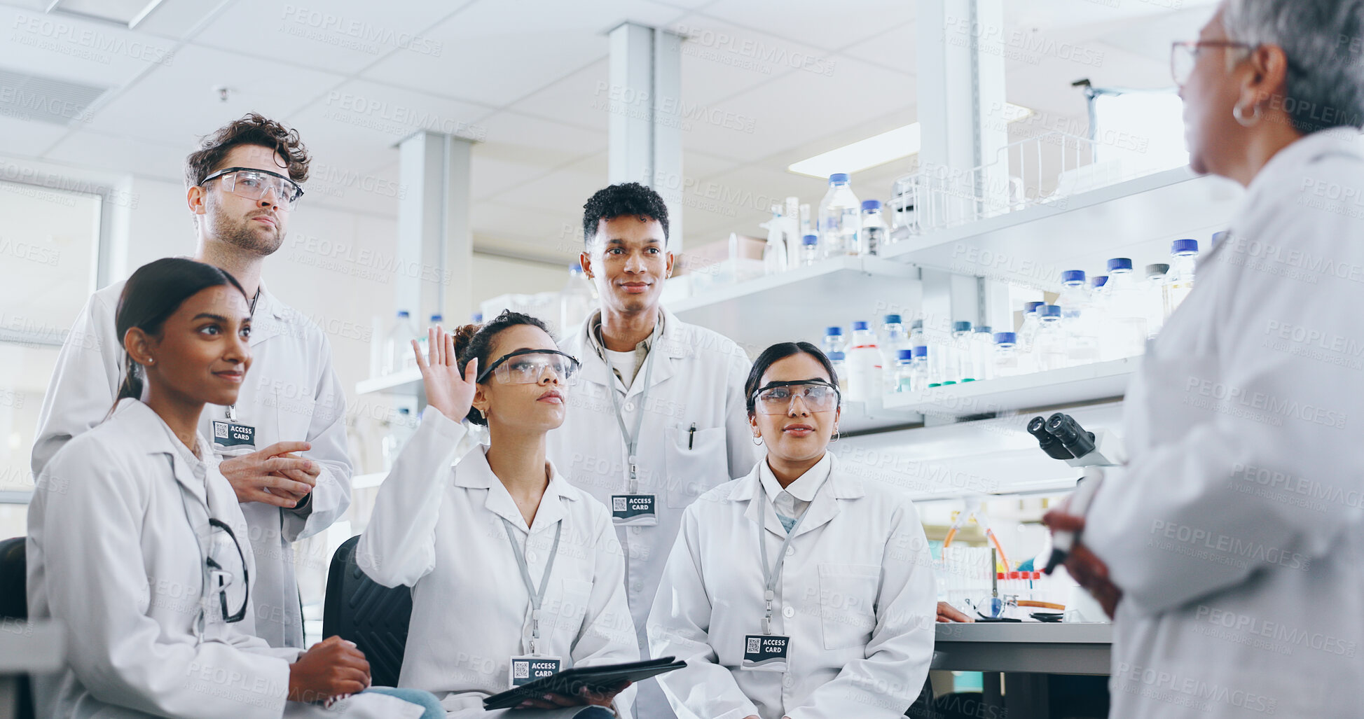 Buy stock photo Meeting, research and group of scientists in laboratory with mentor for bio medical internship. Question, discussion and pharmaceutical science students with lecturer for experiment or discovery.