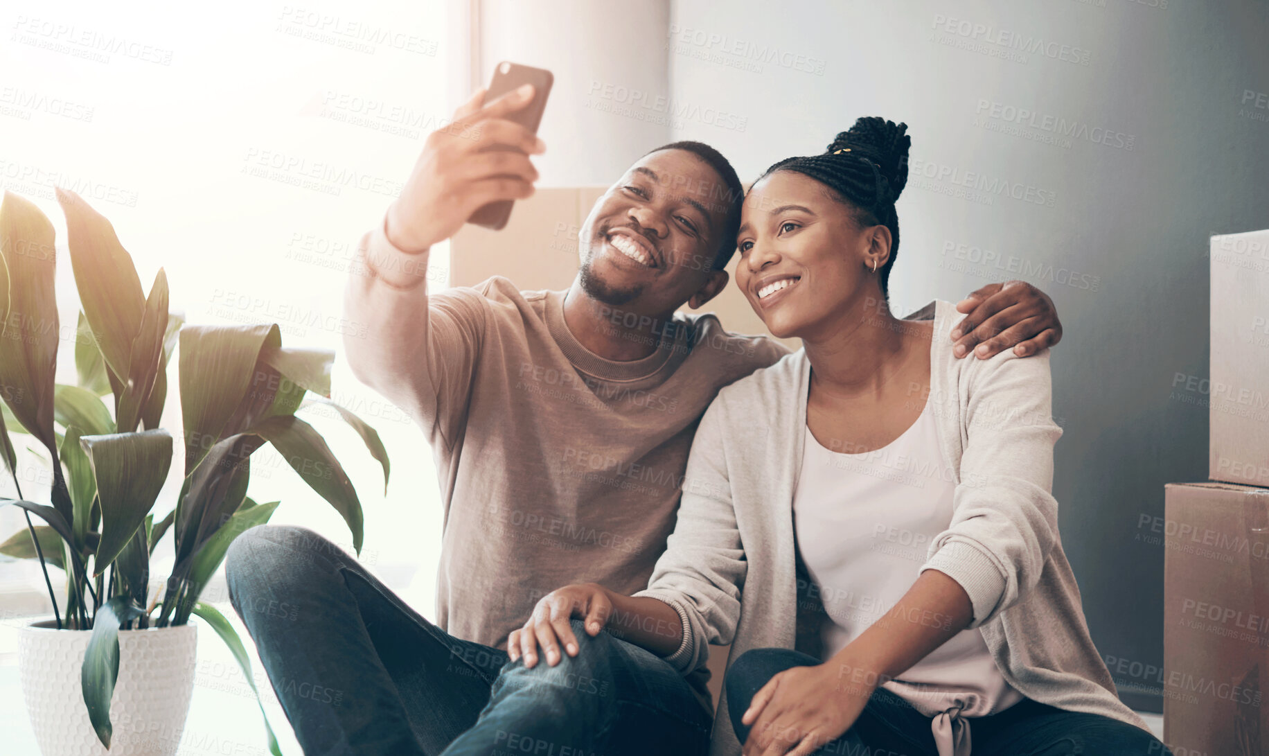 Buy stock photo Black couple, phone and smile for selfie, moving in or real estate, property or new home together. Happy African American man and woman smiling in happiness or satisfaction for photo and buying house