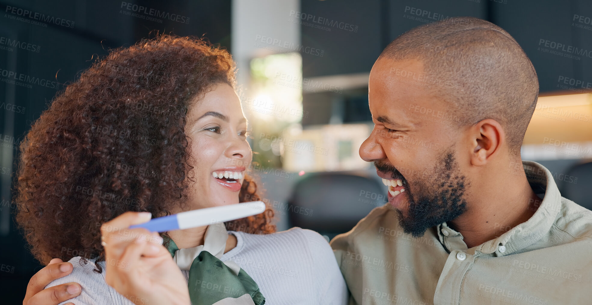 Buy stock photo Smile, man and woman in home with pregnancy test, family planning and support in marriage together. Excited, results and pregnant couple with embrace, love and happy celebration for new parents.