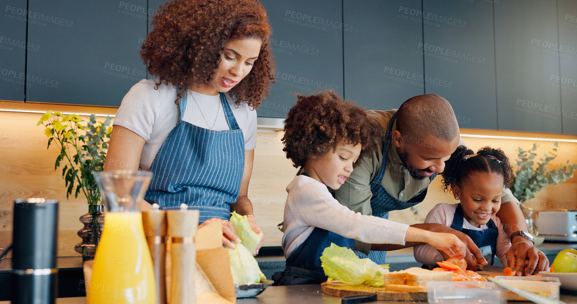 Buy stock photo Sandwich, family or prepare meal with kids for development, learning or nutrition at home. Children, parents or help with knife for education, lunch or growth with fresh vegetables for healthy option