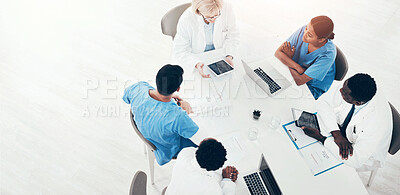 Buy stock photo High angle shot of a group of medical practitioners having a meeting in a hospital boardroom