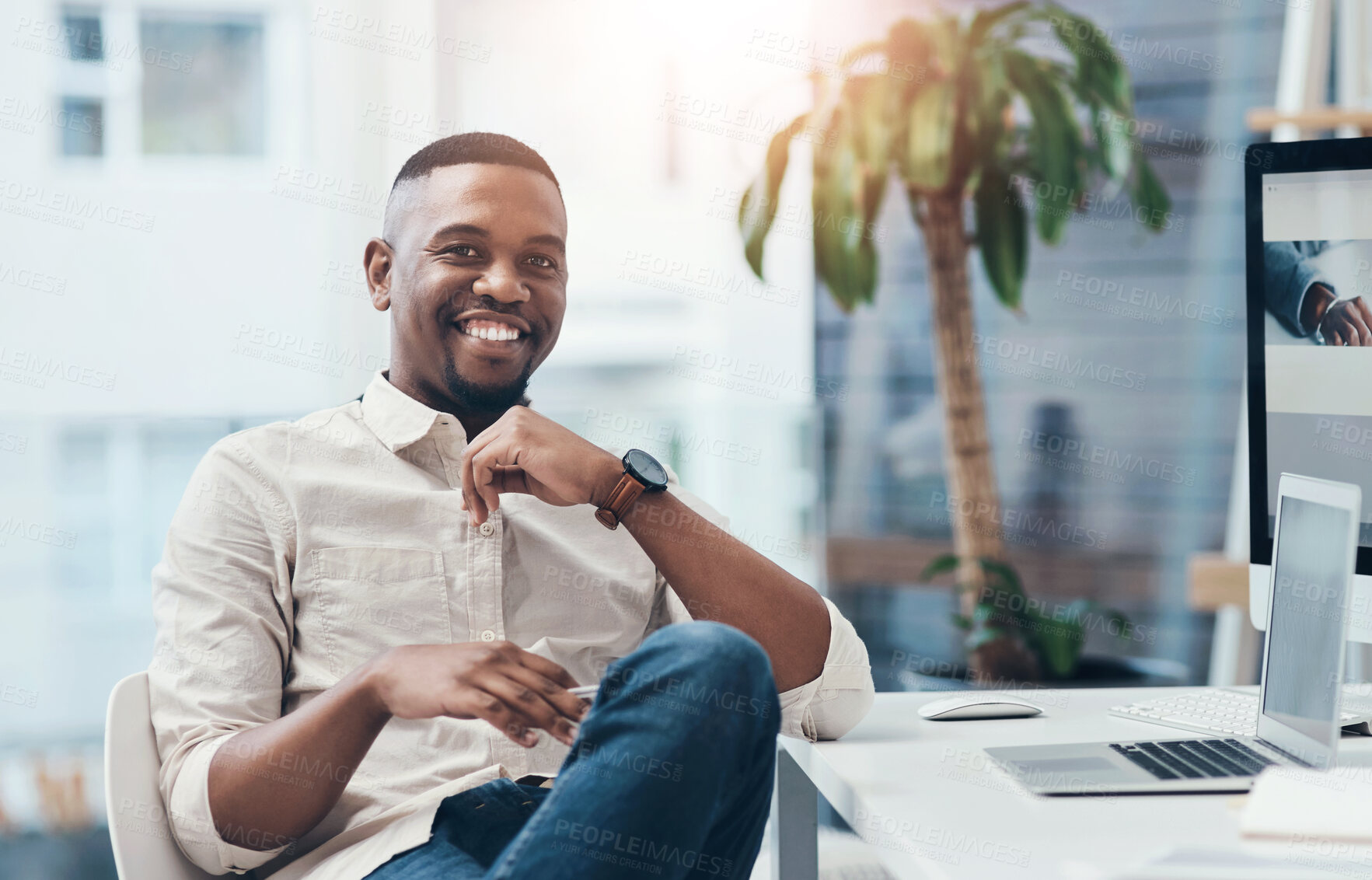 Buy stock photo Smile, desk and portrait of black man at digital agency, office or creative developer with confidence. Happy, website designer or consultant at tech startup with laptop, computer and online career