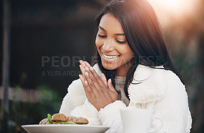 Buy stock photo Shot of a young woman having brunch