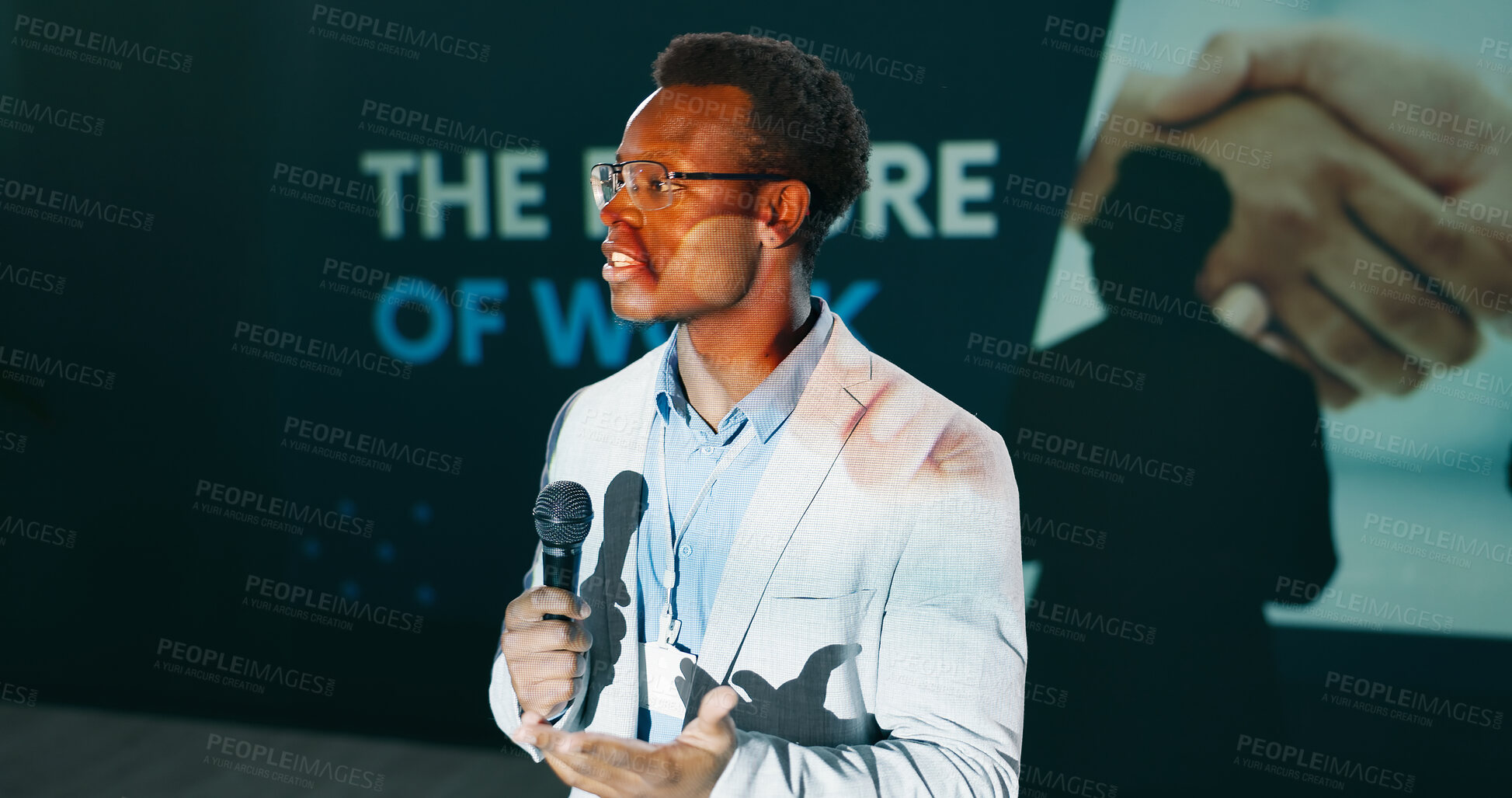 Buy stock photo Future, presentation and speech of man with microphone on stage for business or work seminar. Coaching, development and training with African speaker at event for conference or public speaking
