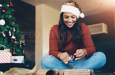 Buy stock photo Woman, wrapping gift for Christmas with tape and gift box, holiday celebration and happiness. Happy woman on living room floor, present with ribbon and paper, smile and celebrate in family home.