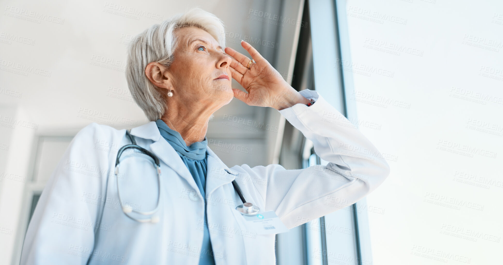 Buy stock photo Senior woman, doctor and fatigue in burnout, grief or mistake against glass window in hospital building. Frustrated physician, medical healthcare and person in stress, loss or headache at clinic