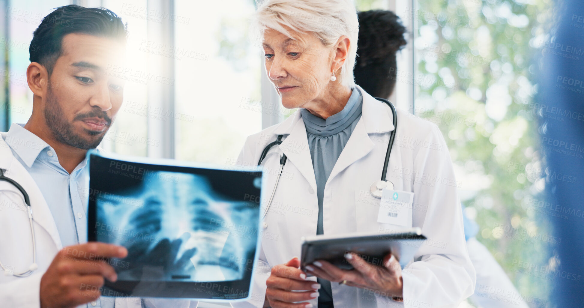 Buy stock photo Doctors, x ray and medical examine in hospital, professional consultation and teamwork collaboration for patient results. Mature radiologist, tablet and researching or diagnosis, people and wellness