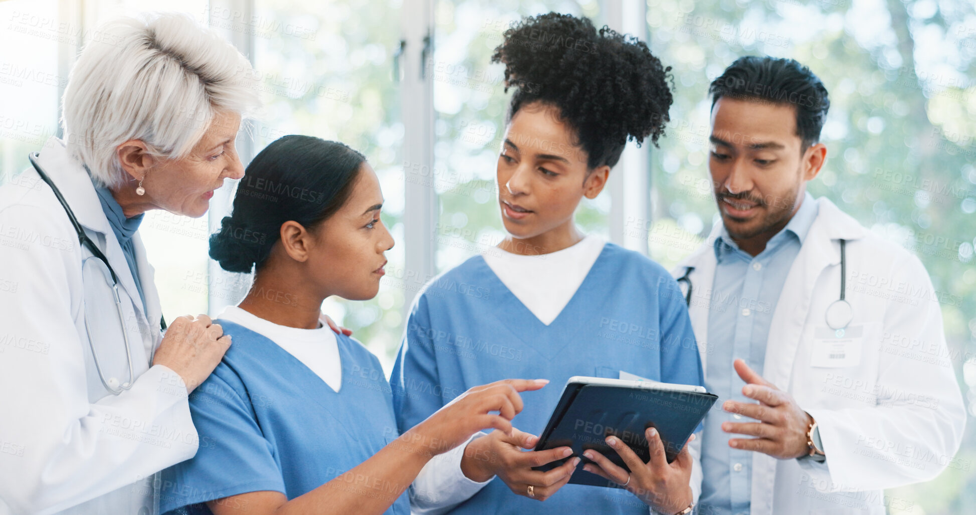 Buy stock photo Doctors, nurses and tablet in hospital for planning, healthcare and digital lab results of patient. Medical team, diversity and tech in clinic for health meeting, collaboration or research with video