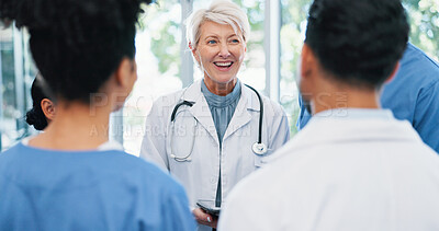 Buy stock photo Discussion, team and doctor with nurses in hospital for collaboration on medical diagnosis. Meeting, conversation and healthcare mentor with cardiology students for feedback on internship in clinic.