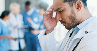 Buy stock photo Asian man, doctor and headache in burnout, grief or mistake against glass window in hospital building. Frustrated physician, medical healthcare and person in stress, loss or fatigue at clinic