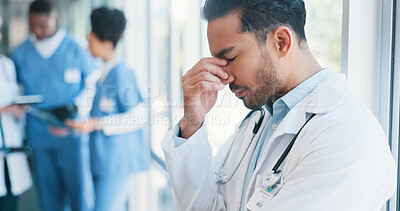 Buy stock photo Asian man, doctor and anxiety in burnout, grief or mistake against glass window in hospital building. Frustrated physician, medical healthcare and person in stress, loss or headache at clinic