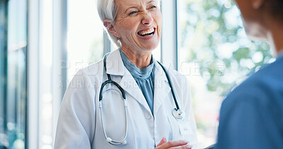 Buy stock photo Discussion, healthcare and doctor with nurse in hospital laughing for people on diagnosis. Happy, conversation and cardiologist mentor with medical student for feedback on internship in clinic