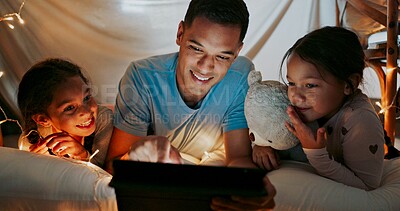 Buy stock photo Reading, night and tablet with family in bedroom of home together for bonding, love or storytelling. Education, learning or relax with father and sister kids on bed in apartment for child development