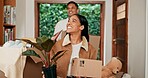 Moving, smile and happy couple with boxes in new home for property investment, real estate or renting. Walking, hispanic woman and proud man with package for mortgage loan, relocation or dream house