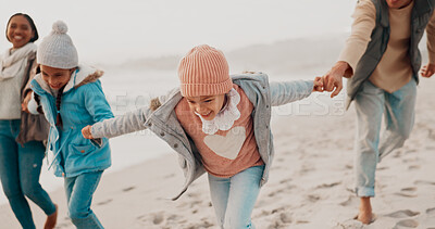 Buy stock photo Family, girl and holding hands in outdoor for travel, freedom and adventure for bonding. Kid, parents and playful with energy as sibling, care and love in happiness, fun and together on beach holiday