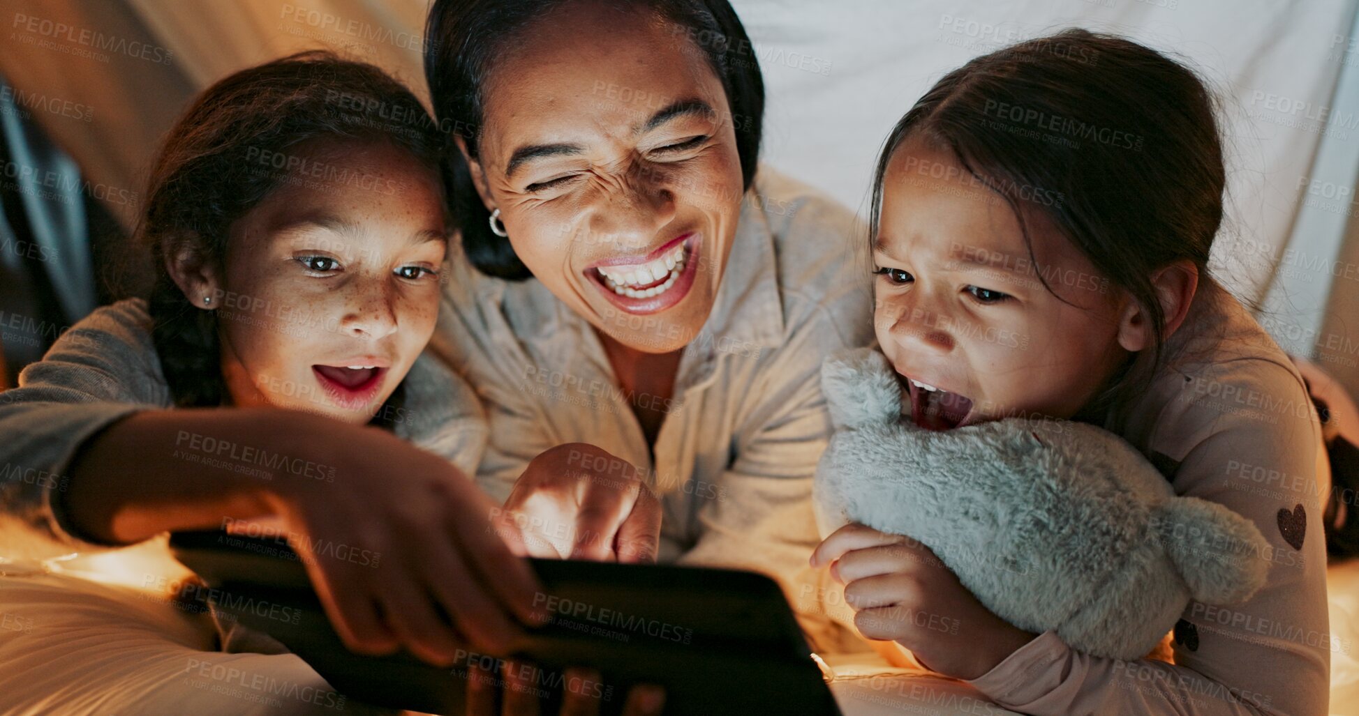 Buy stock photo Night, mom and girl children with tablet on bed for watching movie, cartoon or entertainment in bedroom, Family, surprise and happy woman with kids for bonding, online subscription or relax in home