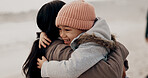 Woman, girl and hug in outdoor for growth, child development and learning for bonding. Kid, mother and playful in parenting, care and love with happy, embrace and together as family in winter holiday