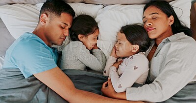 Buy stock photo Rest, parents and children sleeping in bed for nap, dreaming or relax together in bedroom, Top view, family man and tired woman with girl kids in home for support, embrace or comfortable on weekend